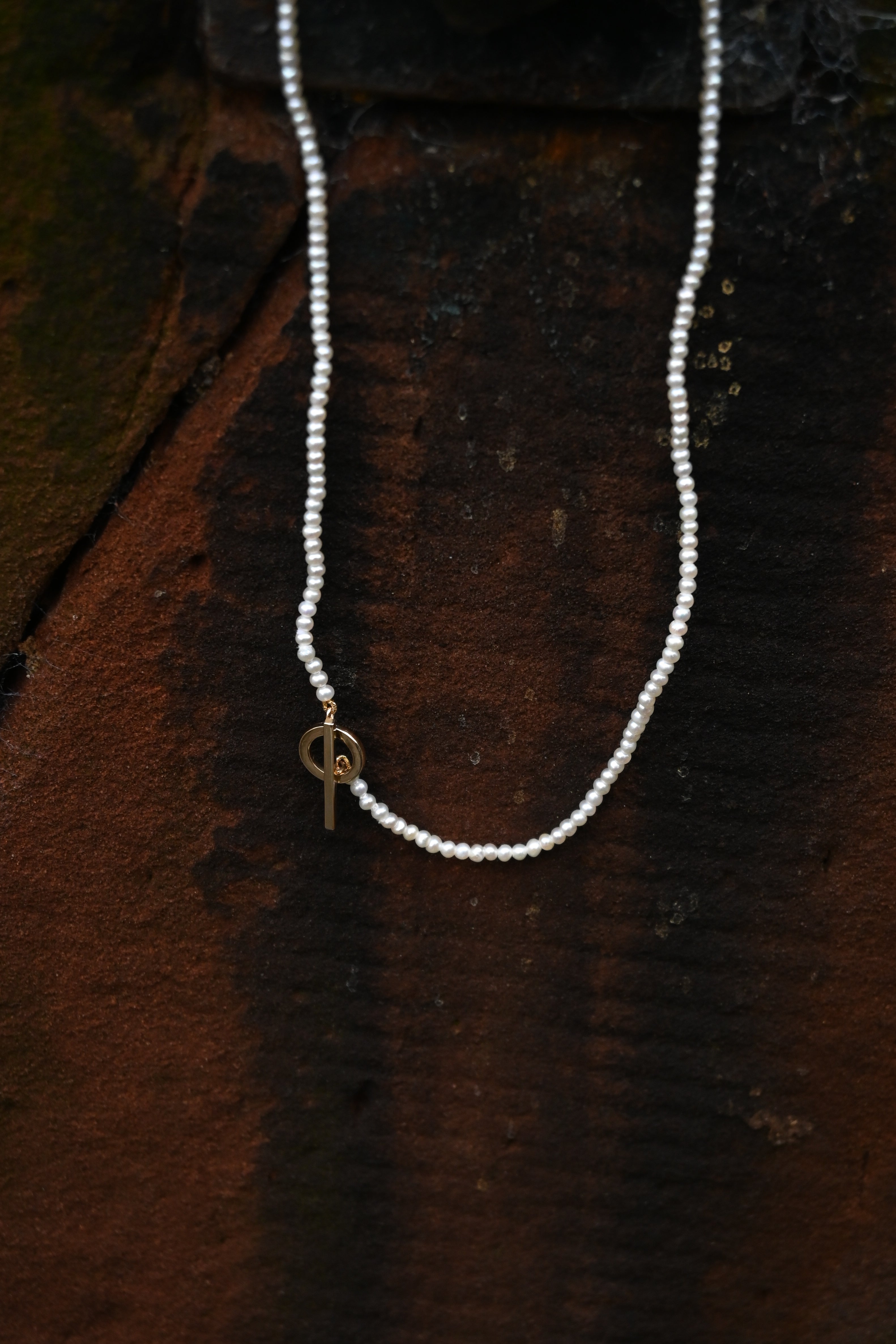 Round Pearl Necklace With 9ct Gold T-Bar Fastening