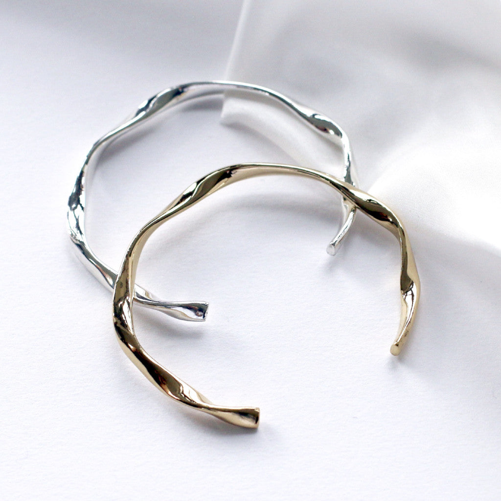 Recycled silver and 18ct gold vermeil plated twisted bangles, ethical jewellery handmade in the UK