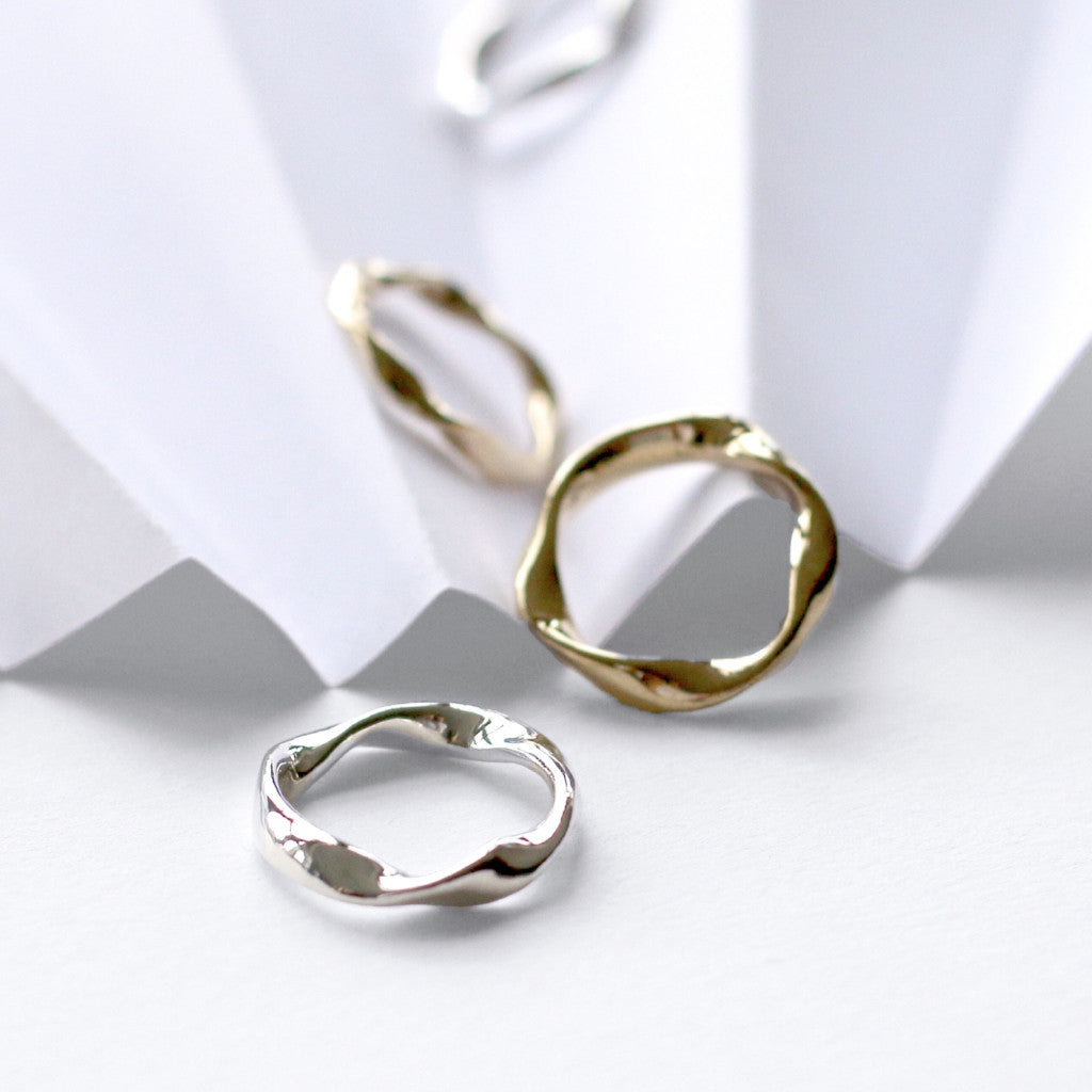 Recycled silver and 18ct gold vermeil plated twisted stacking rings, ethical jewellery handmade in the UK