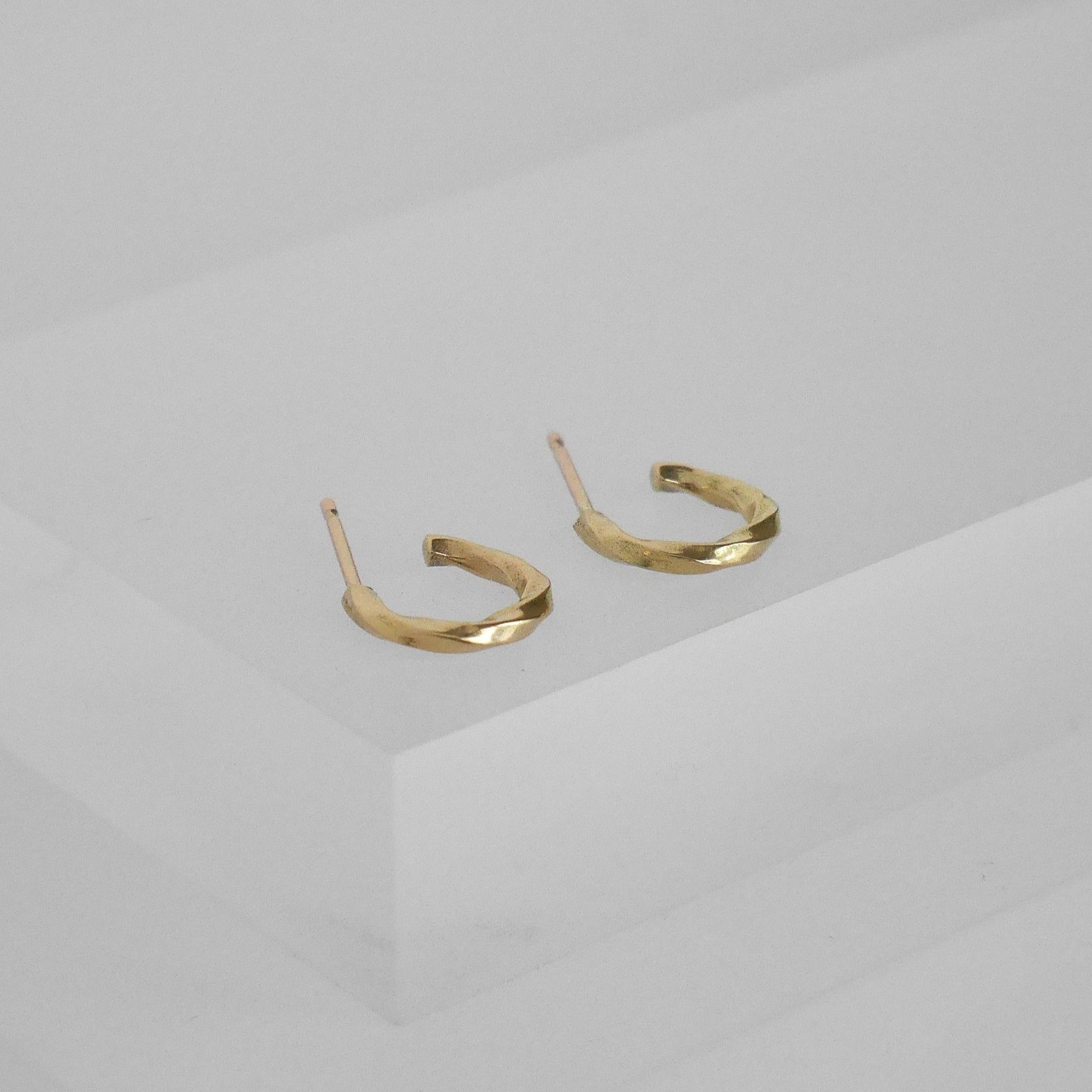 Solid gold minimal everyday huggie hoop earrings, ethical jewellery handmade in the UK