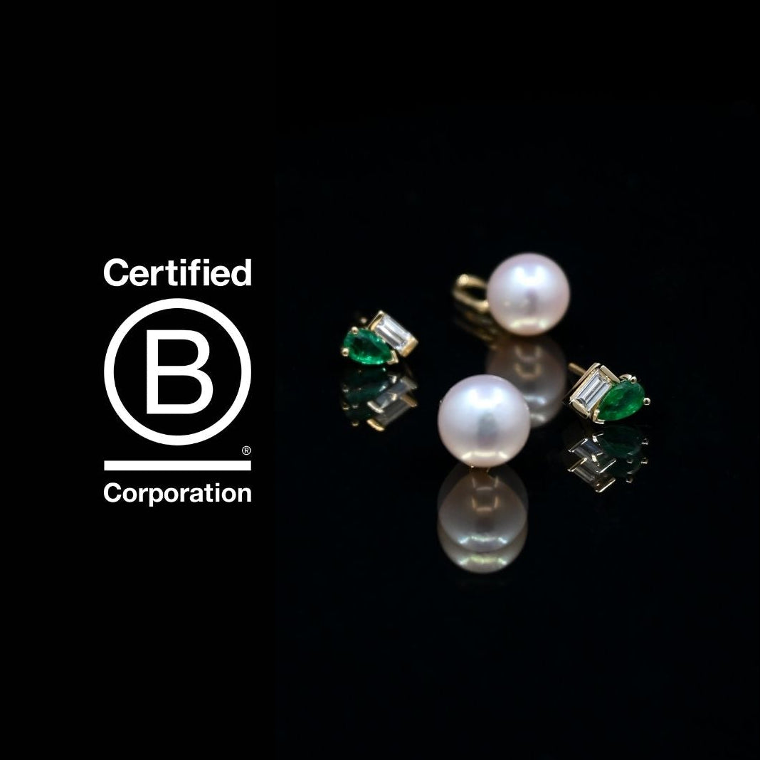 Pearl and emerald earrings on a black background with B Corp certification logo.