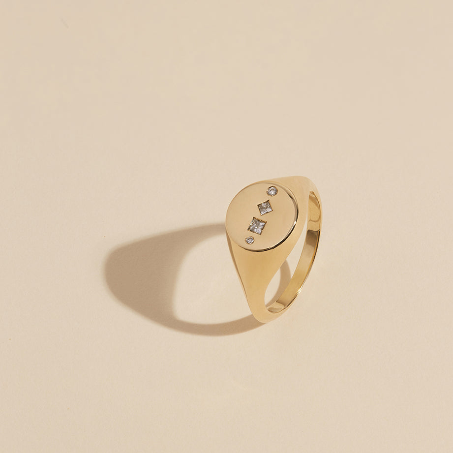 Above view of 9ct solid yellow gold and 18ct solid yellow gold women's diamond signet ring