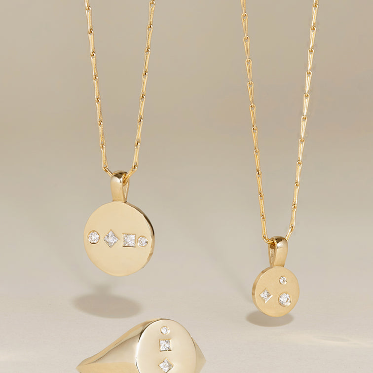 9ct solid yellow gold and 18ct solid yellow gold women's diamond signet ring and 9ct solid yellow gold and 18ct solid yellow gold diamond disc pendant necklace