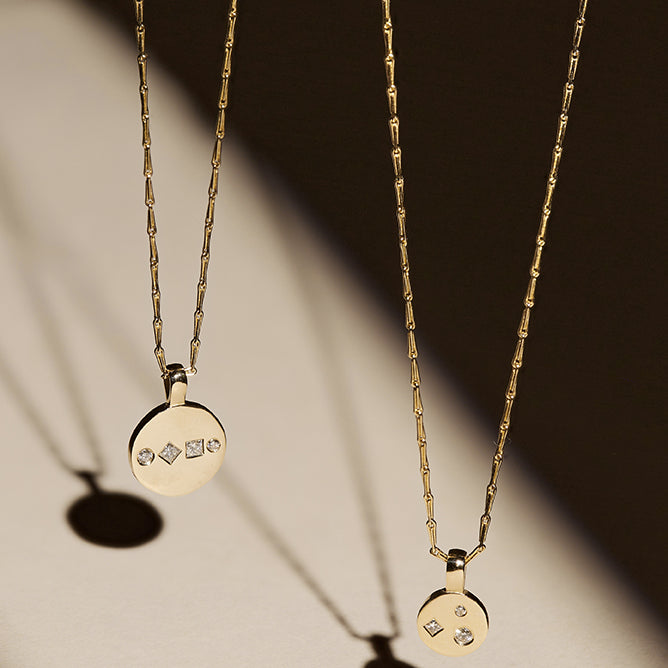 9ct solid yellow gold and 18ct solid yellow gold diamond disc pendant necklace, ethical and sustainable jewellery, handmade in the UK, in spotlight