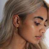 LOKA TWISTED HOOP EARRINGS GOLD