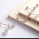 TINY MANI STUD EARRINGS