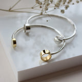 AMATI NEGATIVE SPACE BANGLE
