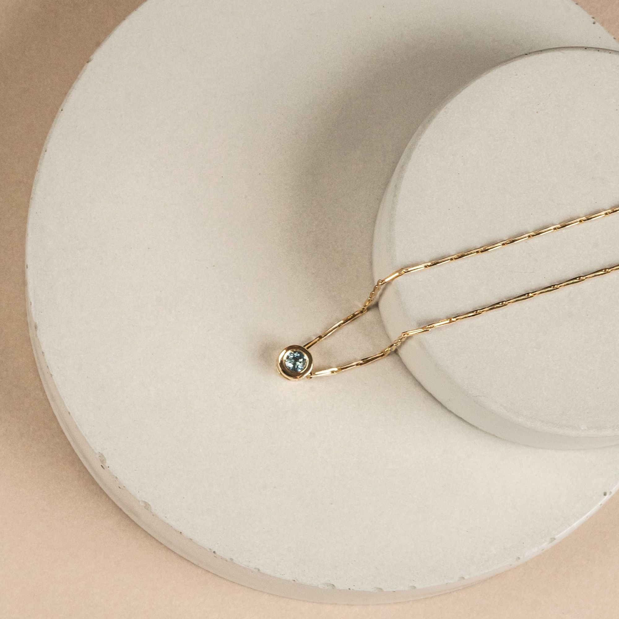 teal sapphire fairmined gold necklace