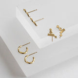 KOTI gold crawler earrings